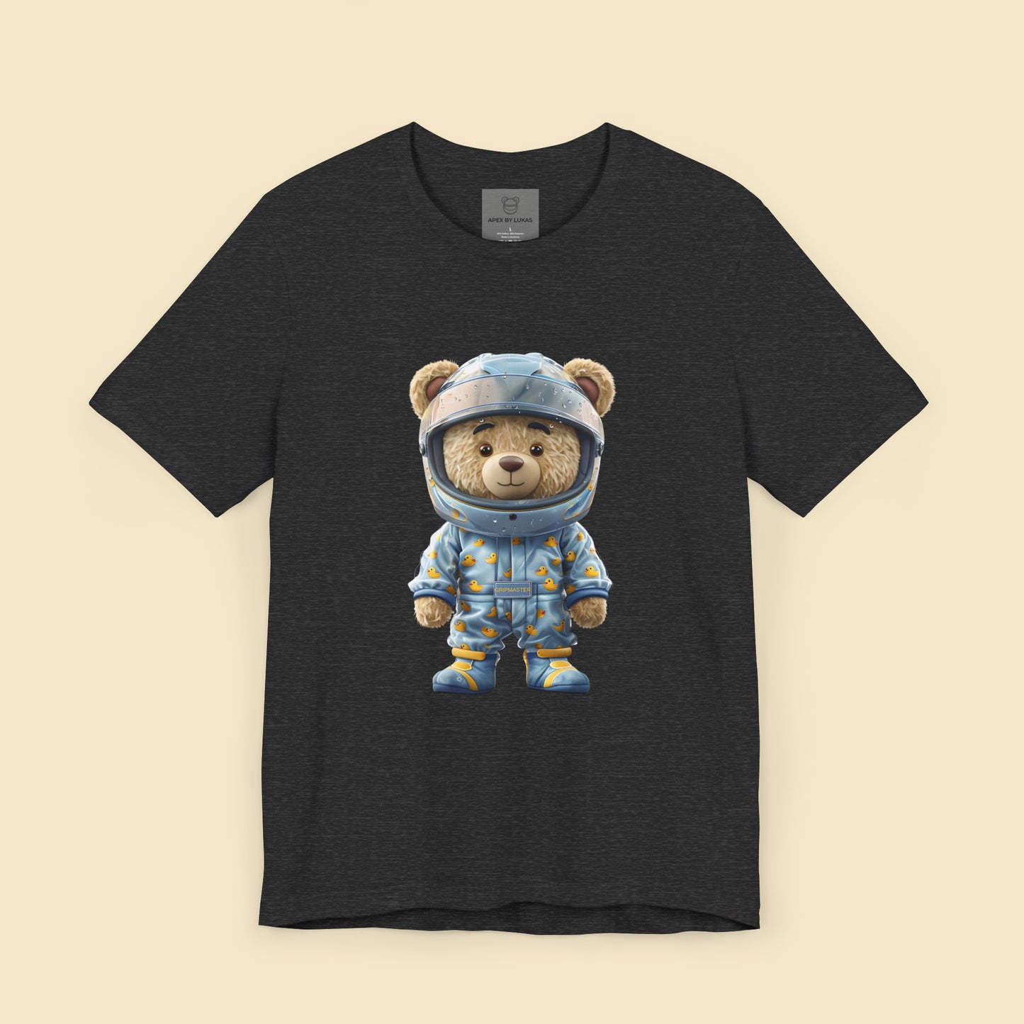 Grip Master teddy bear wearing a light blue karting racing suit with cute rubber duck pattern and light blue helmet on a dark grey heather unisex streetwear t-shirt