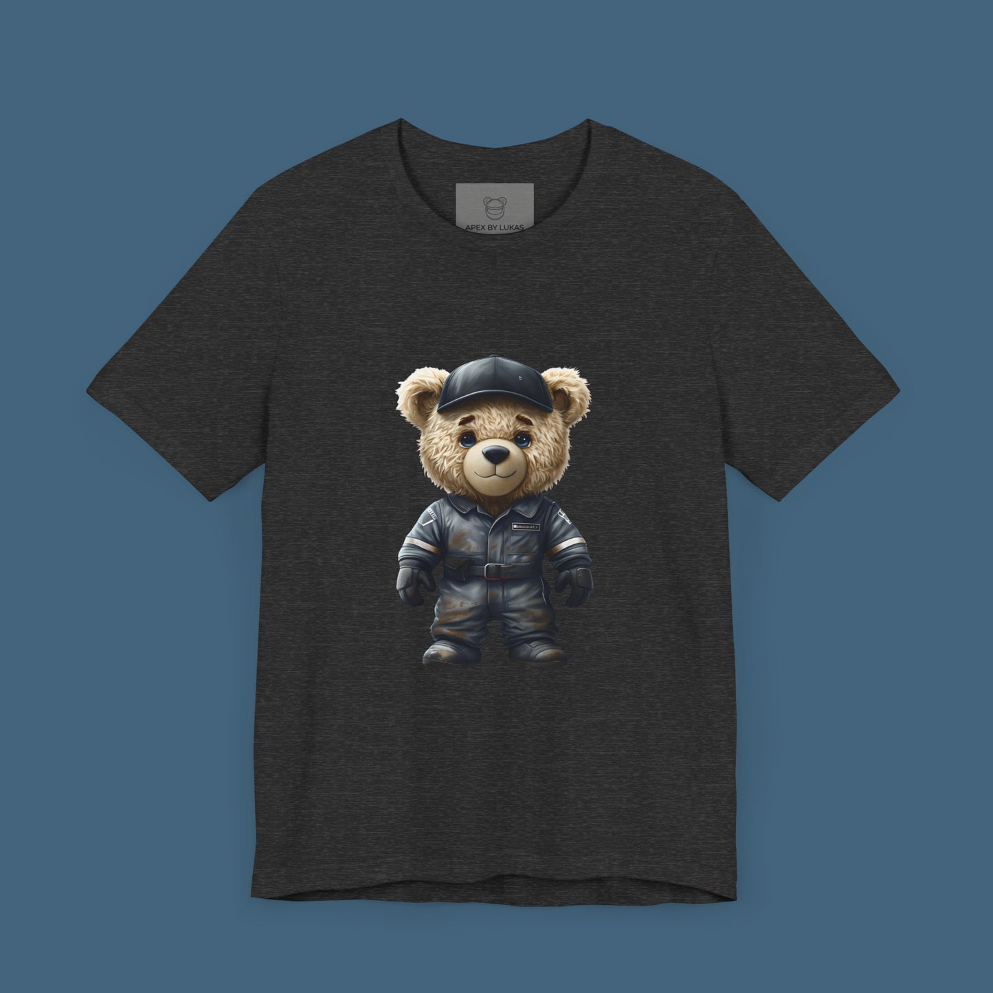 A teddy bear wearing a dark grey, dirty karting racing mechanic suit on a dark grey heather color unisex t-shirt
