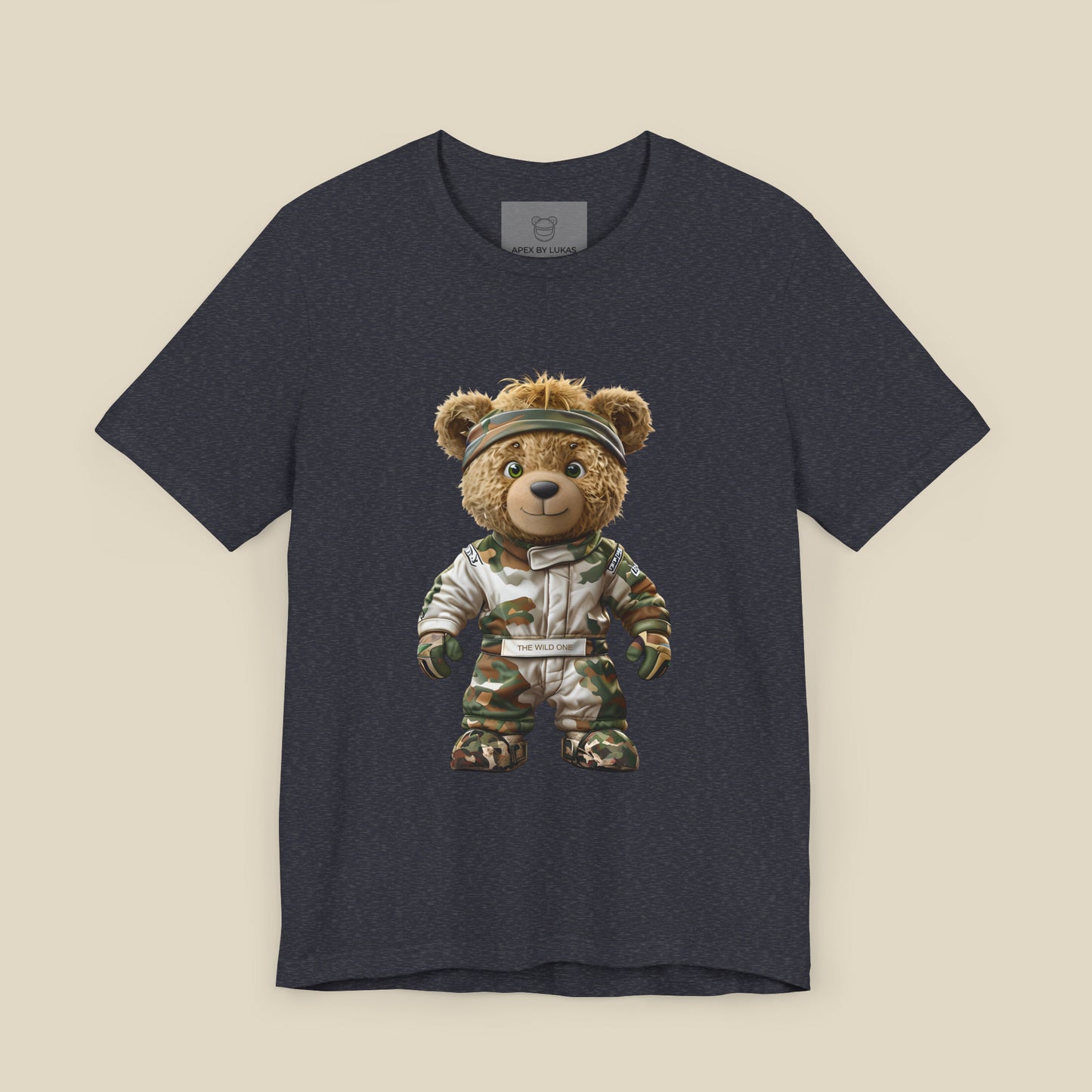A teddy bear with messy hair wearing a military green racing suit with dirt patches and a bandana on a heather navy unisex t-shirt