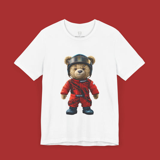 A teddy bear wearing a red karting racing suit with tyre marks, helmet and name patch "Redline" on white streetwear t-shirt