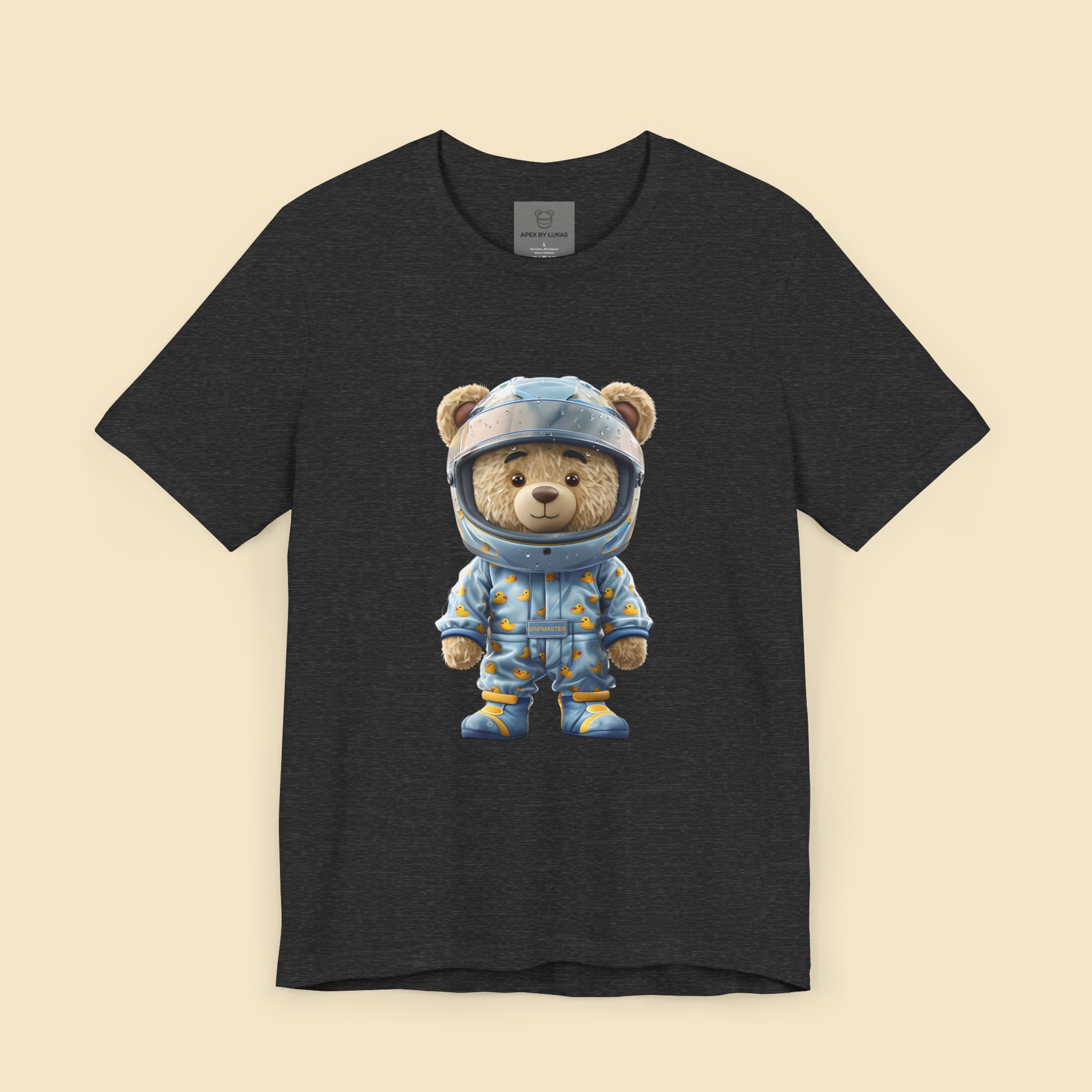 Grip Master teddy bear wearing a light blue karting racing suit with cute rubber duck pattern and light blue helmet on a dark grey heather unisex streetwear t-shirt