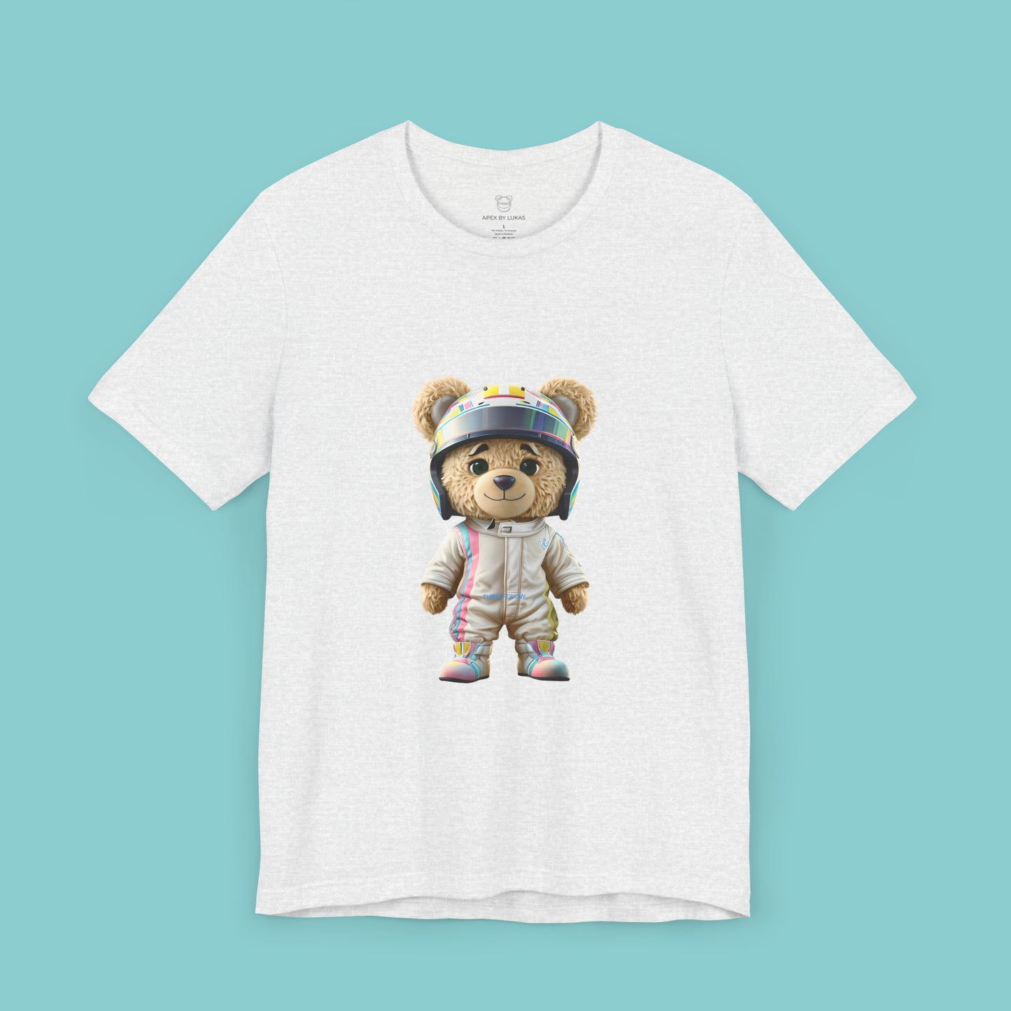 Teddy bear wearing a karting racing suit in beige color with light pink and blue lines on the side and a helmet on an ash t-shirt