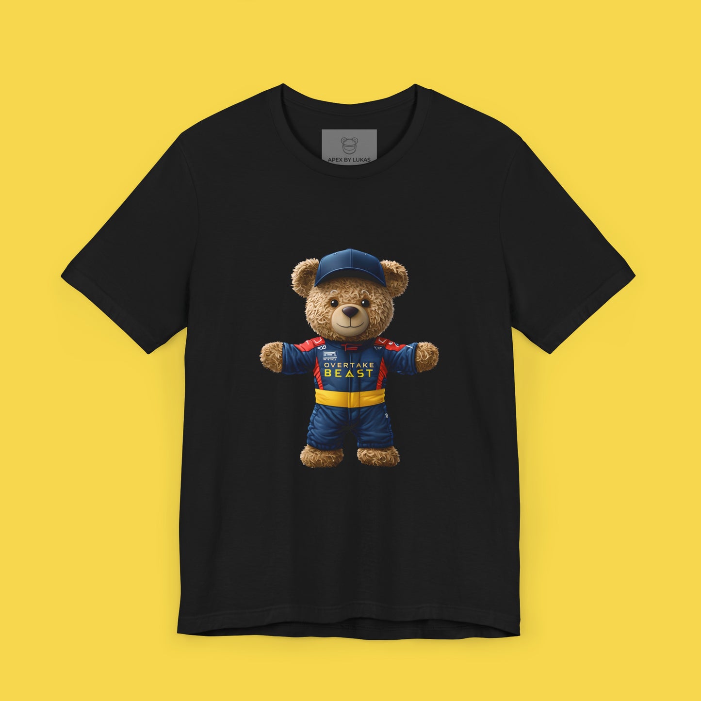 A confident teddy bear wearing Red Bull style racing suit and a dark blue cap on a black unisex t-shirt