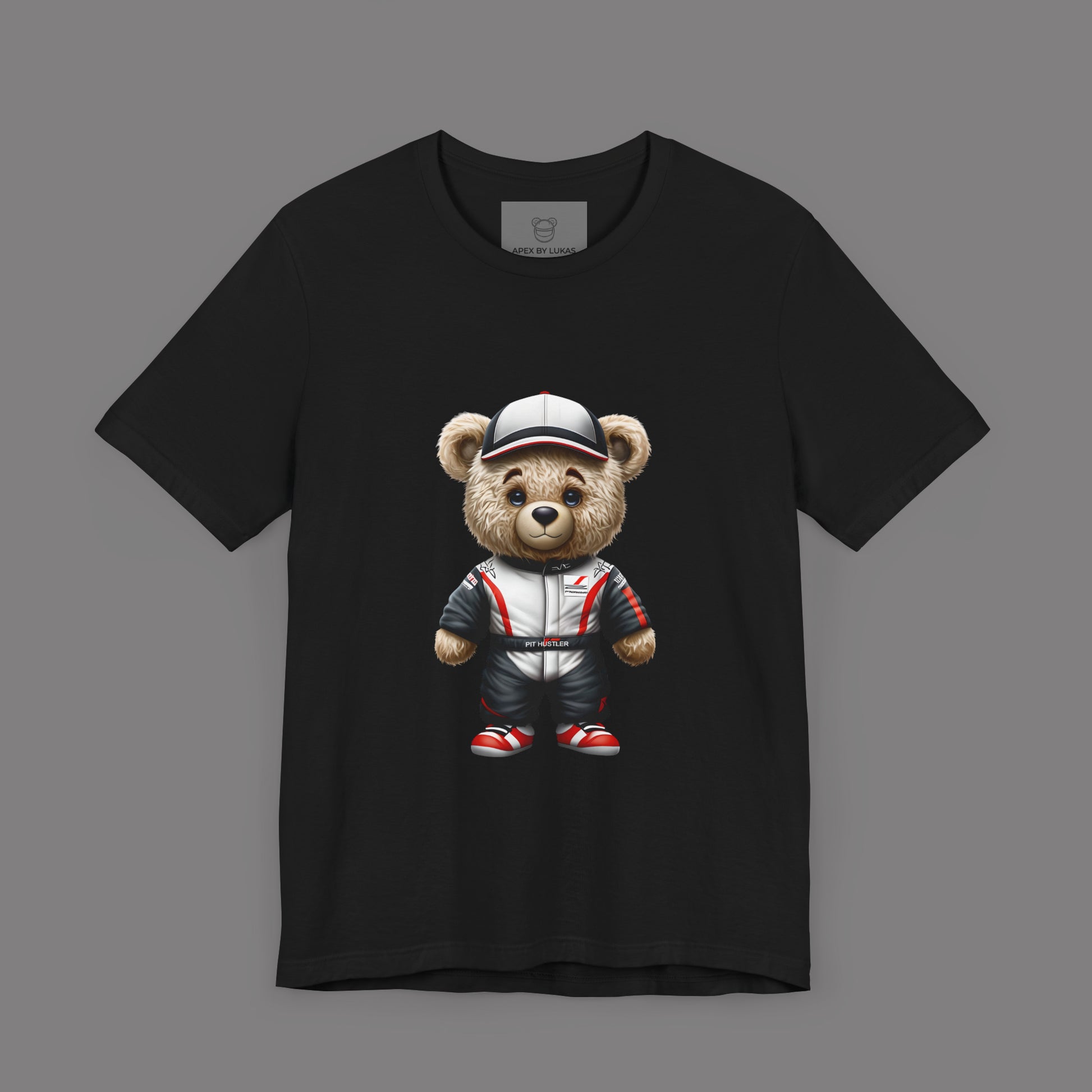 Serious yet cute Teddy Bear wearing a Haas look a like racing suit and a cap in white color with black and red accents on a black unisext-shirt