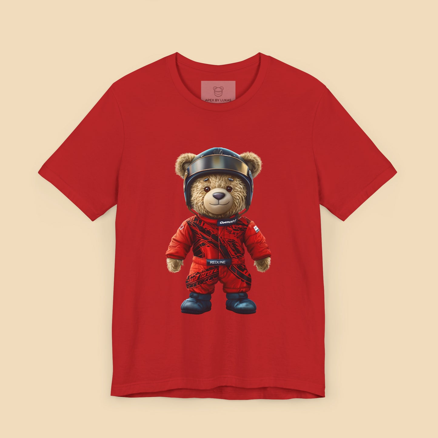 A teddy bear wearing a red karting racing suit with tyre marks, helmet and name patch "Redline" on a red streetwear t-shirt