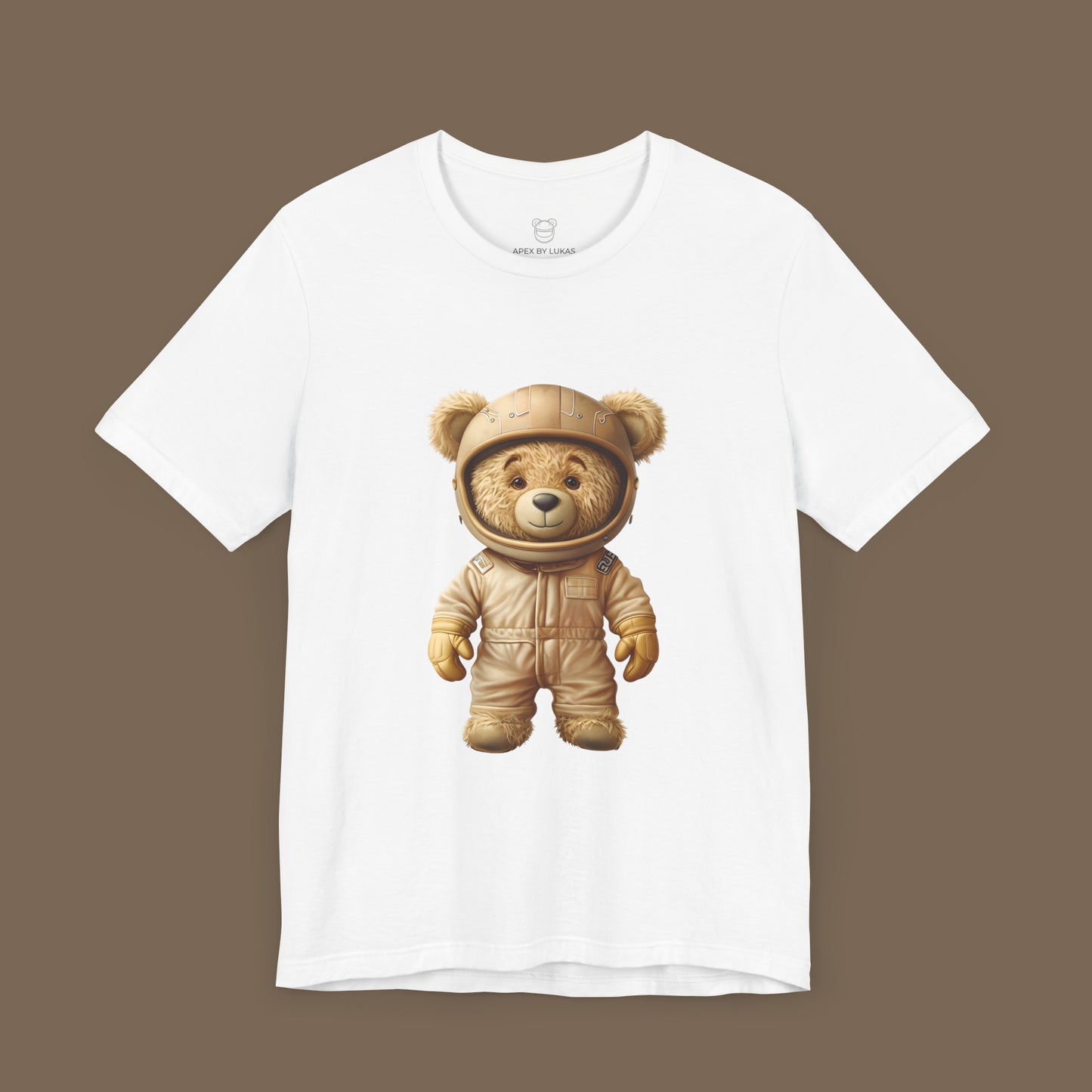 Light brown teddy bear wearing a beige retro karting racing suit and a helmet on a white unisex t-shirt
