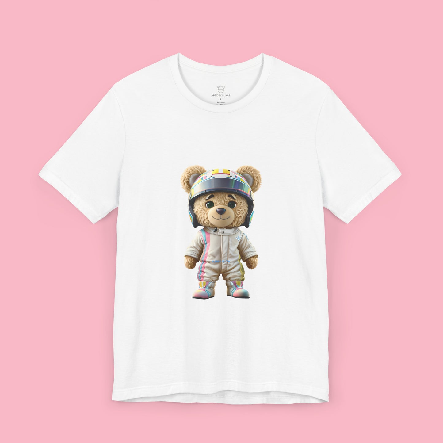 Teddy bear wearing a karting racing suit in beige color with light pink and blue lines on the side and a helmet on a white t-shirt